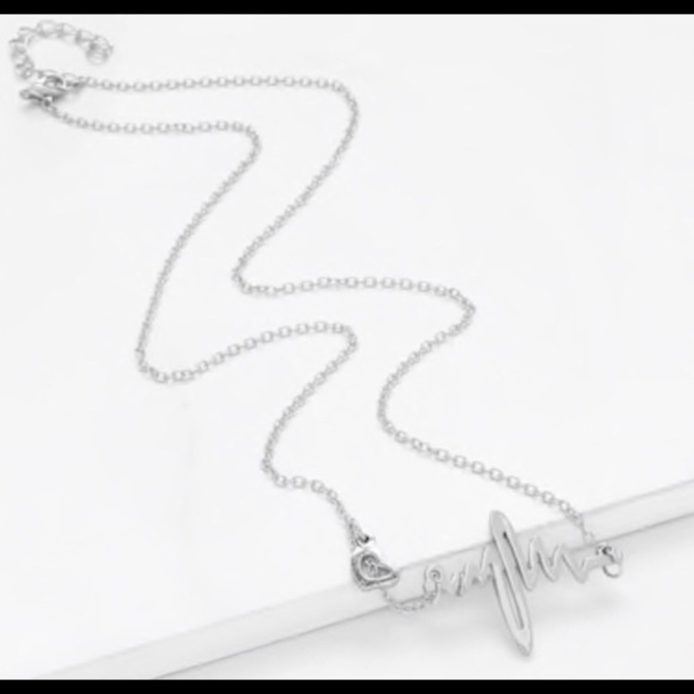 Silver heart beat ekg tracing trendy necklace… - Picture 2 of 3